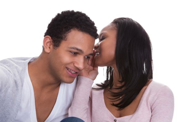 black couple whispering telling secrets bad marriage advice