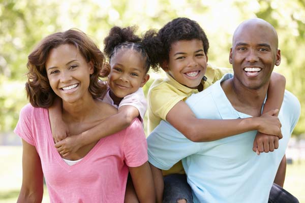 happy black family african american couple with kids how to be grateful in relationships