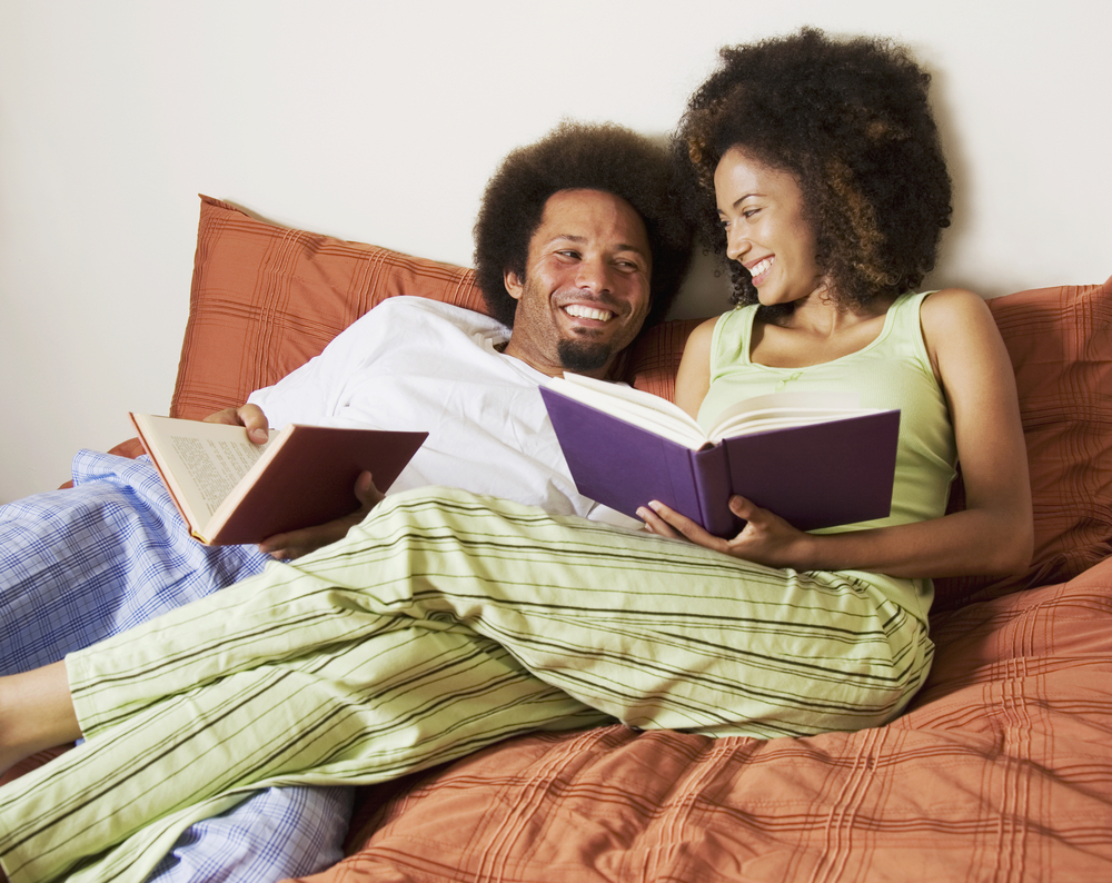 Couple Bed Read Happy helping your spouse grow spiritually
